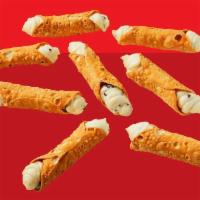 Cannoli (3) · 3 crispy pastry shells filled to order with a sweet cannoli cream filling mixed with chocola...