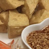 Fried Tofu · Golden-fried tofu, sprinkled with crushed peanuts. Served with tangy sweet and sour sauce.