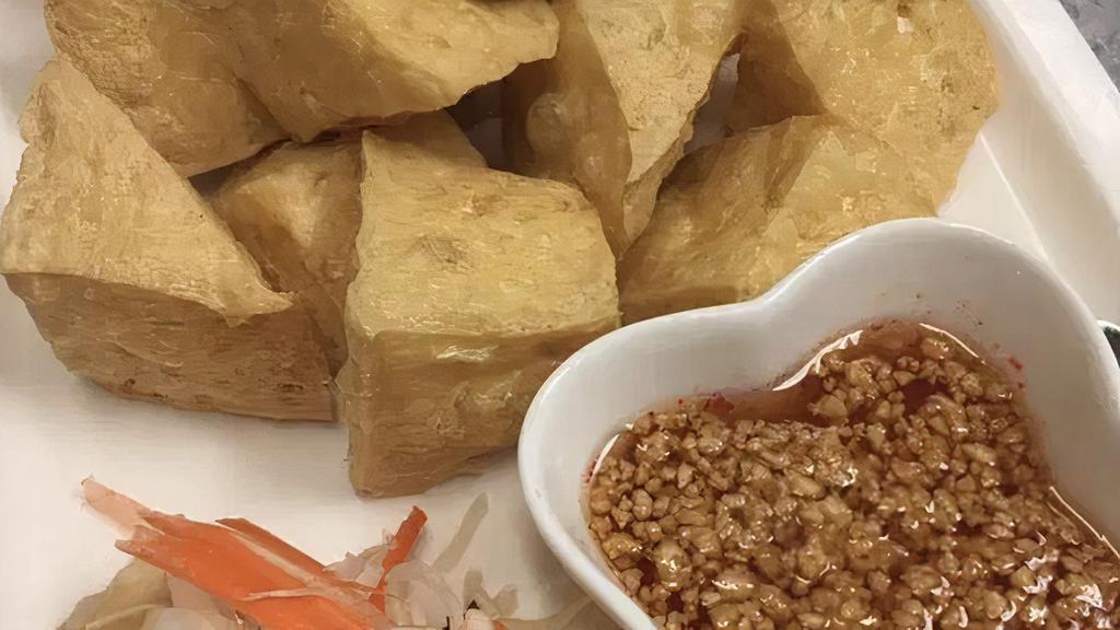 Fried Tofu · Golden-fried tofu, sprinkled with crushed peanuts. Served with tangy sweet and sour sauce.