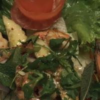 Papaya Salad · Fresh shredded green papaya, carrots, garlic, crushed peanuts, tomatoes, green beans, and sh...