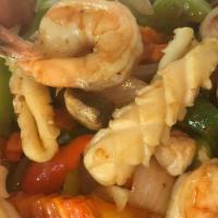 Combination Seafood  · Mixed seafood sautéed with onions, mushrooms, bell peppers, carrots, and sweet basil in Gran...