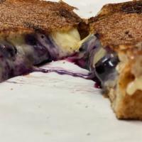 Little Blue Balls · Havarti, fontina, blueberry compote on sliced french dusted with cinnamon & sugar