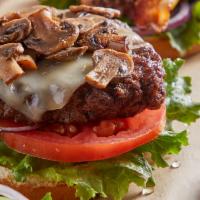 Mushroom Swiss Burger · A real flavor trip. Sautéed mushrooms and melted swiss cheese paired with lettuce, tomato, a...