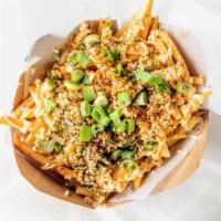 Dynamite Fries · Topped with Sriracha, Spicy Mayo, Green Onions & Furikake Seasoning.