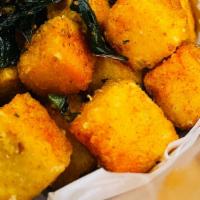 Fried Tofu · Golden Fried Tofu with butter garlic  seasoning. Add choice of sauce and enjoy!