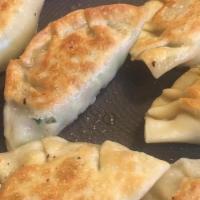 Chicken Gyoza · Fried Chicken Gyoza 
(Fried Dumpling) 

Add Dipping Sauce and enjoy!