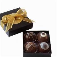 4 Piece Chocolate Truffle Box · Our signature product, the chocolate truffle, wraps creamy French-inspired ganache with dark...