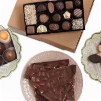 The Giver Box · Box includes: ½ lb. assorted chocolate traditional box, eight-piece assorted grand chocolate...