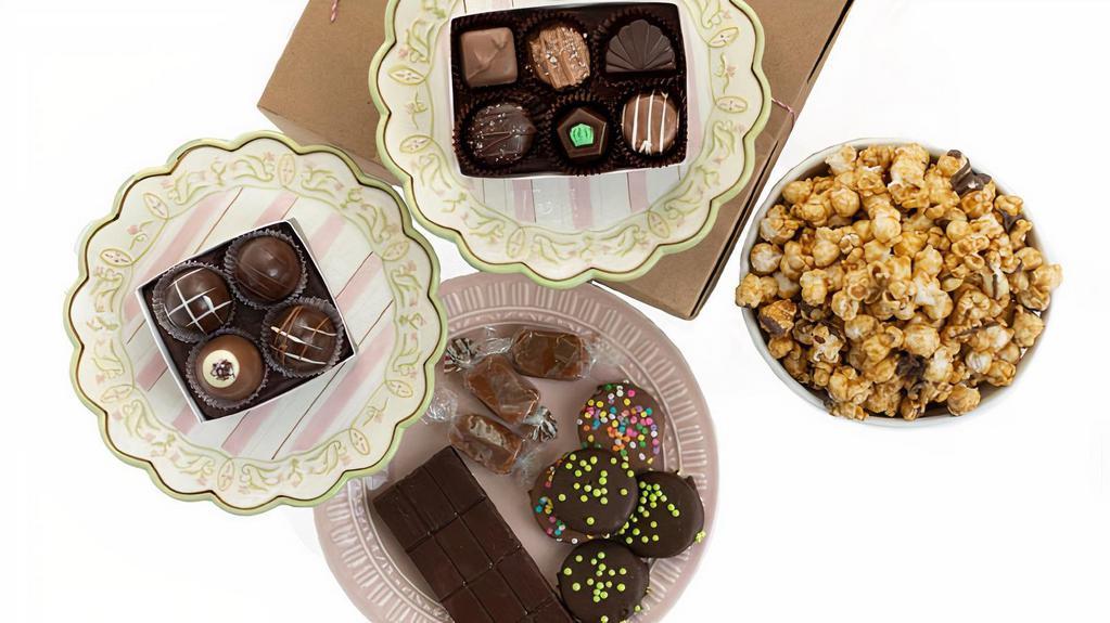 What’S Mine Is Yours Box · Box includes: ½ lb. assorted chocolate traditional box, ½ lb. Sea salt caramel popcorn with dark chocolate drizzle, two-dark or milk belgian chocolate bars, two-belgian milk chocolate rice crispy pops, 
8-milk and dark belgian chocolate Oreo cookies.