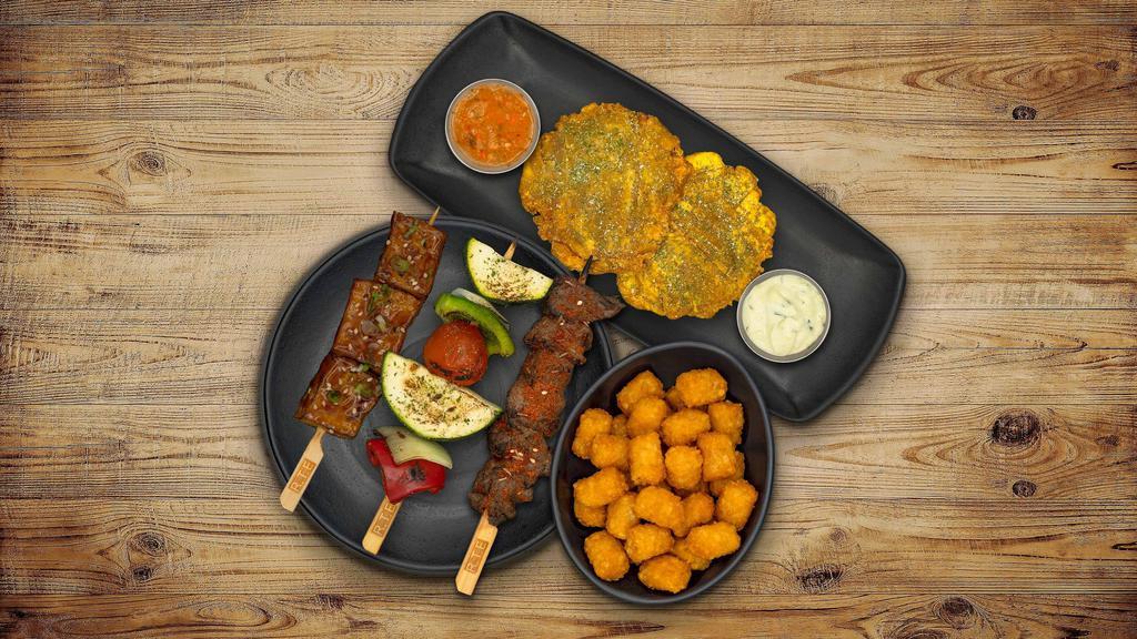 Skewer Combo Plate · Your choice of base, 2 protein skewers and sauces. 
Each combo plate includes 1 mix veggie skewer and tostones (fried green plantain),