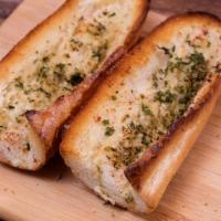 Garlic Bread · Oven baked with garlic butter and parmesan cheese