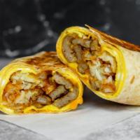 Impossible Sausage, Egg And Cheddar Breakfast Burrito · 3 fresh cracked, cage-free scrambled eggs, melted Cheddar cheese, 2 impossible sausage patti...