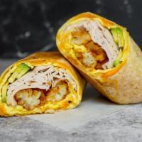 Turkey, Avocado, Egg And Cheddar Breakfast Burrito · 3 fresh cracked, cage-free scrambled eggs, melted Cheddar cheese, smoked sliced turkey breas...