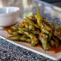 Spicy Edamame · Garlic, ginger, sesame oil, chili flakes, oyster sauce, soy sauce.