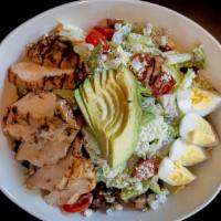 Grilled Chicken Cobb Salad · Romaine lettuce, applewood smoked bacon, eggs, tomatoes, avocado, bleu cheese, ranch dressing.