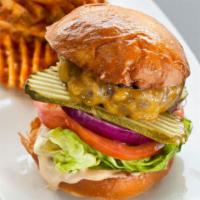 Public House Burger · Half pound burger, pickles, onions, tomatoes, lettuce, thousand island dressing.