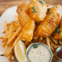 Beer Battered Fish And Chips · Alaskan cod, french fries, lemon, tartar sauce.