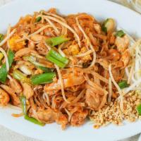 Pad Thai · Pan fried thai noodles with chicken, egg, green onion, chopped peanuts, fresh bean sprouts a...