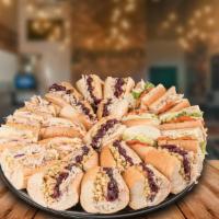 The Turkey Lover™ - Party Tray · Assortment of our delicious oven-roasted turkey subs:. The Bobbie®, Cole Turkey® and the Hom...