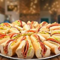 Little Italy™ - Party Tray · Paying homage to our heritage, this tray is loaded with nothing but tasty Italian subs. (Ser...