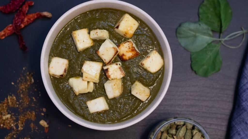 Palak Paneer · An indian style fresh  cheese whit a spiced creamy spinach.