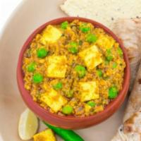 Matter Paneer · A punjabi dish consisting of pees and paneer in a tomatoes  based sauce spiced whit garam ma...