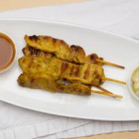 Satay · Choice of beef, chicken, or tofu marinated in coconut cream with herbs and spices. Grilled a...