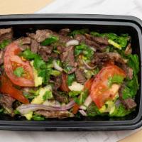 Yum Neau Salad · Sliced steak seasoned with lime juice, cilantro, red onion, scallion, tomato, chili, cucumbe...