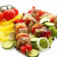 Shish Kabob Salad · Fresh salad made with Shish Kabob, lettuce, tomato, cucumber, onion and crazy sauce.