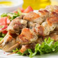 Chicken Kabob Salad · Fresh salad made with Chicken Kabob, lettuce, tomato, cucumber, onion and crazy sauce.