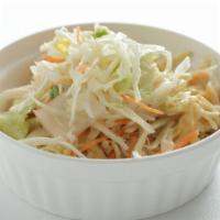 Cabbage Salad · Fresh cabbages peeled, and mixed with garlic, olive oil, and lemon juice.