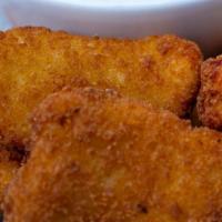 Jalapeño Poppers · Stuffed with cream cheese and coated in light, crispy breading.