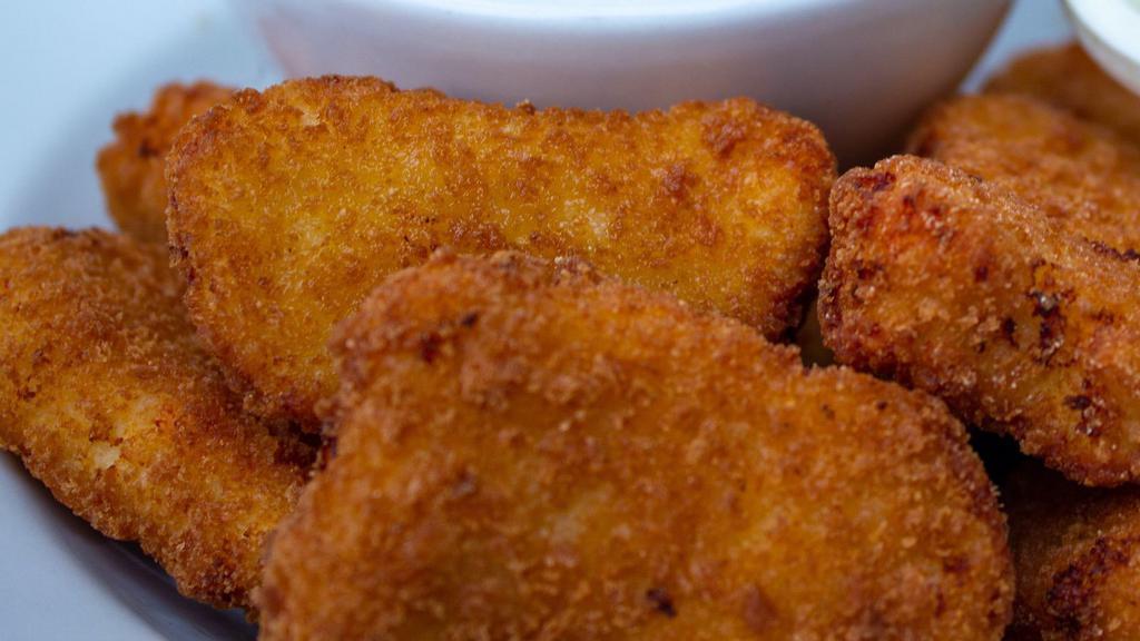 Jalapeño Poppers · Stuffed with cream cheese and coated in light, crispy breading.