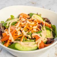 Garden Salad · Lettuce, spinach, cucumber and tomato with our special dressing.