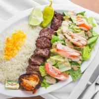 Beef Shish Kabob · Marinated pieces grilled with onion, tomato, and bell peppers.