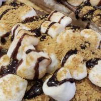 S'More Toast? · nutella, marshmallows, and graham cracker crust baked onto toast, topped with chocolate sauc...