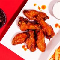 The Cole · 6 crispy fried chicken wings with a choice of side.