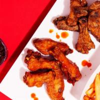 The Ryan · 10 crispy fried chicken wings with a choice of side.