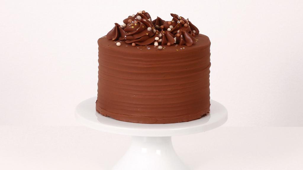 6' Chocolate Cake · A six layer rich Valrhona chocolate cake with decadent chocolate buttercream, serves 6-12.