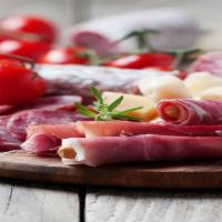 Antipasto Salad · Italian cold cuts with artichoke hearts, roasted peppers, roma tomatoes, and provolone chees...