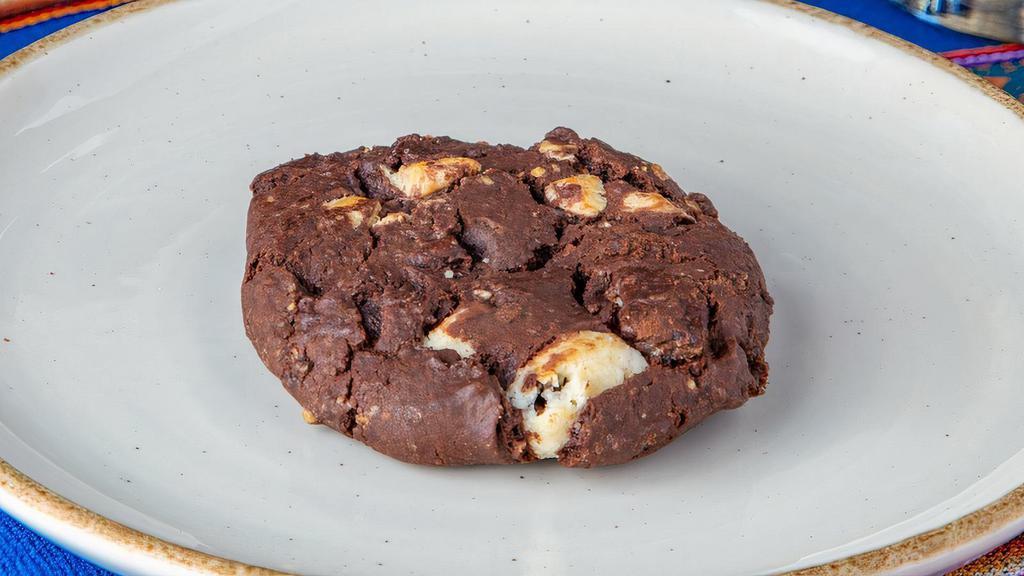 Triple Chocolate Cookie · White and dark chocolate chips in our rich dark chocolate cookie dough.