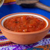 Fuego Salsa · Our signature fire roasted salsa with a hint of chipotle (spicy).