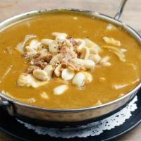 Massaman Curry · Potatoes, Carrot, Onion, Peanut, Fried Shallot, Coconut Milk, Massaman Curry Paste, Chili Oil