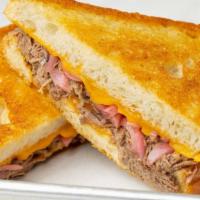 Short Rib Grilled Cheese · Coffee Braised Shortrib, Cheddar, Pickled Red Onion,  on Sourdough