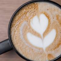 Latte · Double shot of espresso with hot steamed foamed milk