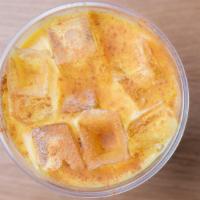 Almond Turmeric Latte · House made; almond milk, turmeric, ginger, black pepper, cinnamon + honey.  Served hot or ic...