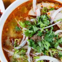 Bun Bo Hue · Hue style lemongrass beef noodle soup A rich and spicy multi-layered soup with lemongrass, t...