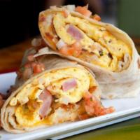 Ham And Cheese Burrito · Fluffy eggs with ham, hash browns, and cheese tucked in a flour tortilla.