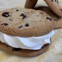 Vanilla · Our creamy soft serve vanilla in between 2 chocolate chip cookies.