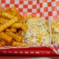 Kluckin Tacos · Two tacos, coleslaw, Mexican cheese chicken tender and kluckin sauce.